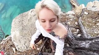 A cute girl passionately sucks dick on the ocean shore