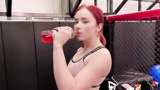 The gym trainer gave a portion of punishment to the red-haired girl