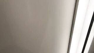 A girl is having fun with the salesman in a fitting room, getting naughty