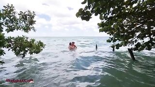 A young couple enjoys an intense and passionate sex session in the blue lagoon