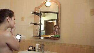 Mature blonde masturbates with her big boobs in the morning