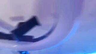 The sexy stepmom washes the dishes in her underwear