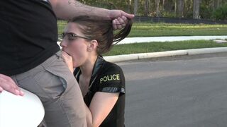 A female police officer uses her power to take control