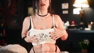 A big-breasted goth girl plays with her new toy and gets fucked by it
