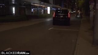 Two red-haired beauties share a huge black cock in an intense threesome