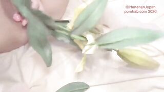 Masturbation while putting flowers in a girl’s anus