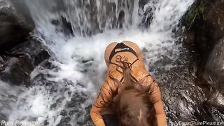 Brunette amateur fucks near the waterfall on a sunny day in POV