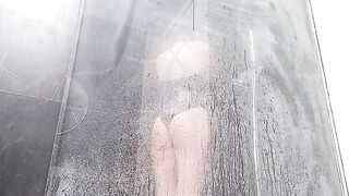 The girl came to the shower and began to masturbate her pussy