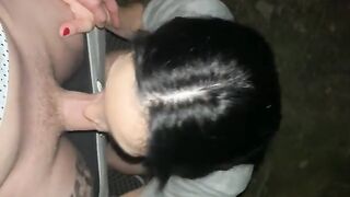 A babe is having fun outdoors, getting her mouth filled with cum