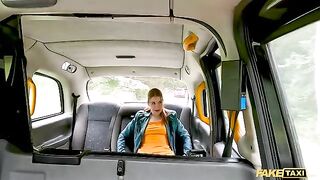 A sexy passenger, the stunning redhead Kiara Love, squirts on the cabbie’s dick