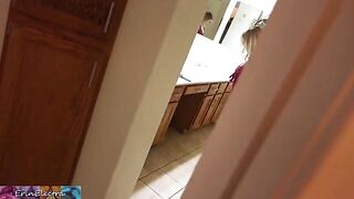 The stepmom is getting ready for bed while being watched