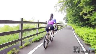 A couple enjoys romantic sex while on a bike, cycling to nowhere