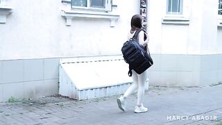 A girl is having fun with a stranger in a hostel, mimicking the wild scenarios often seen in FakeHostel.com videos