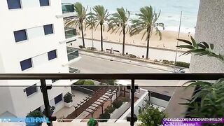 A couple has sex on the balcony, right by the sea