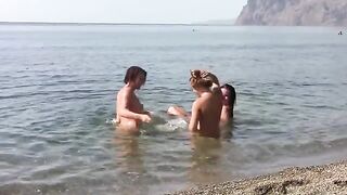 Three naked beauties on the beach with erporn