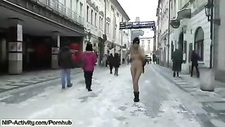 A student bares her boobs and ass on the street