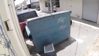 A hidden camera took intimate shots near the rubbish bin