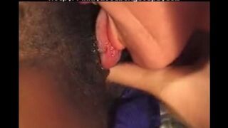 An old white guy is having fun with a young black girl
