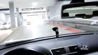 A blowjob in a car while the guy is driving