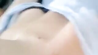 A half-naked girl is telling lies and caressing her body with her hands