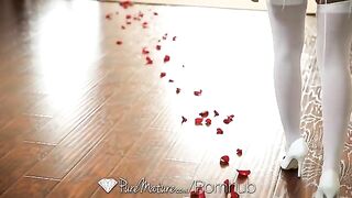 A young brunette girl is having fun with someone special on the bed