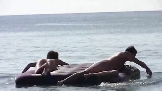 A tan beauty got naked on the beach and showed her boobs