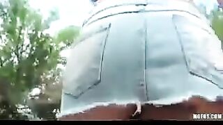 Hot brunette girl masturbating on the city streets in front of the camera