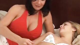 Two young girls having fun with their older, experienced lesbian friend