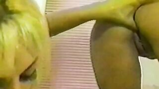 The hot girls have fun with each other in the shower using toys