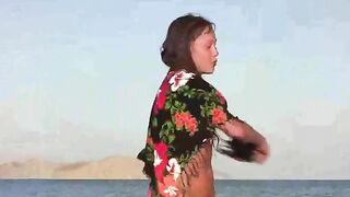 A member shows a girl the way to nakedness