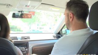 A cute girl is fucking with her driving instructor in the car