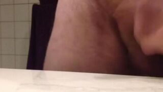 The guy sprinkled hot sperm on the table while working with his fingers