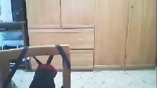 A woman fucks in front of the webcam at home