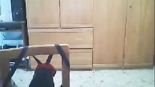 A woman fucks in front of the webcam at home