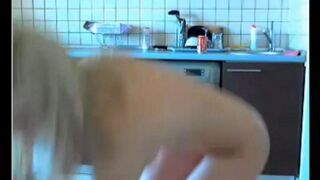 Young beauty masturbates with her kitchen webcam online
