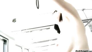 A cute girl plays with balls and puts them in her vagina