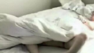 A girl masturbates in the bedroom with a hidden camera