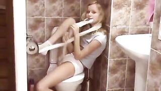A young cute blonde has a surprise for you in the public toilet