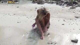 A couple enjoys private sex on the beach, away from prying eyes