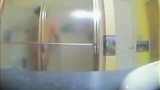 A girl took a shower not knowing that someone was secretly filming her