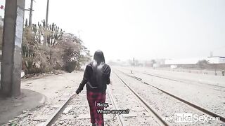A guy approached a girl near the train line in Peru to hook up