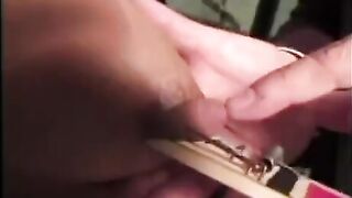Tied up woman is being hit and humiliated for having big tits