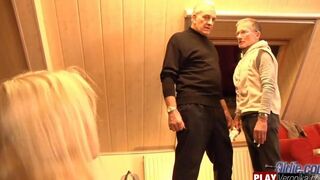 A young blonde with gray hair in the beard has sex