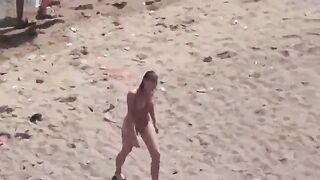 A pair of naked people at the sea