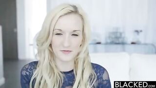 A blonde woman is fingering with a vibrator while fucking a black guy