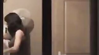 He admires himself in the mirror completely naked