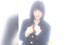 A Japanese schoolgirl masturbates herself in her uniform, showcasing her youthful charm