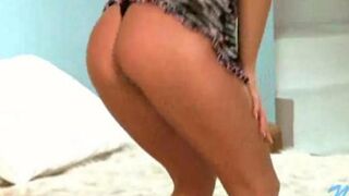 A young Russian lecherous blonde makes a striptease for the camera