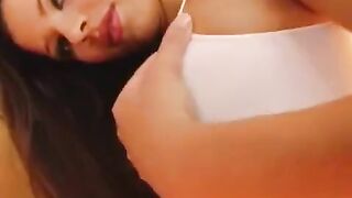 The girl played with a dildo and showed her wet vagina in close-up