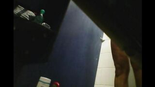 A girl washes herself in the shower, not knowing there’s a camera